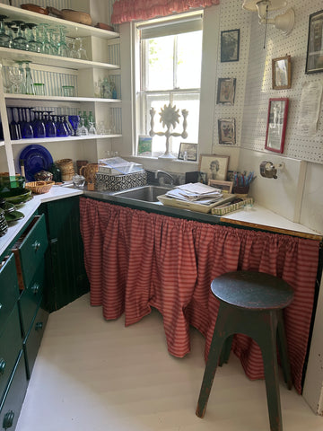 A custom sink skirt at the summer house
