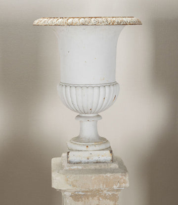 Set of Four 19th Century French Cast Iron Urns on 19th C Stone Plinths