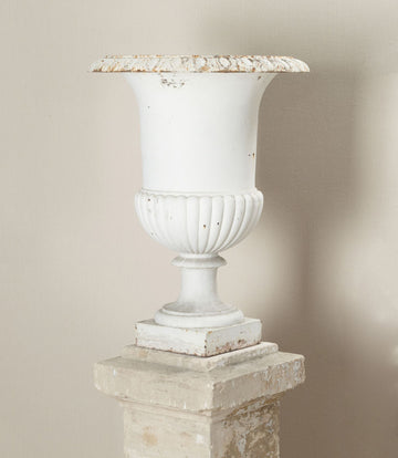 Set of Four 19th Century French Cast Iron Urns on 19th C Stone Plinths