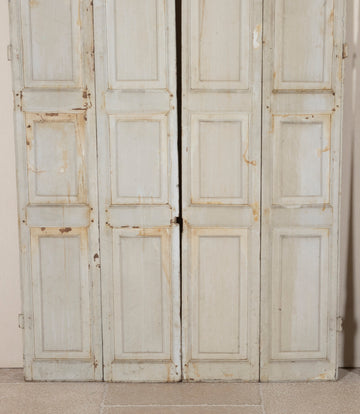 Two Pairs of 19th Century French Painted Panelled Folding Shutters