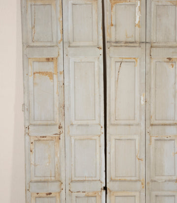 Two Pairs of 19th Century French Painted Panelled Folding Shutters